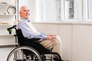 elder sitting on wheelchair